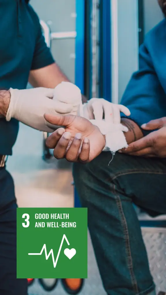 "A medical professional bandaging a person's hand, symbolizing the United Nations' Sustainable Development Goal 3: Good Health and Well-being.