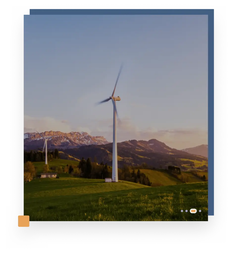 two windmills on the top of the mountain with a blue background frame.